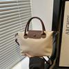 Bolsa Dumpling Feminina 2025 Explosões de Primavera alta qualidade Bolsa de Ombro Moda Costura Cor de Contraste Bolsa Transversal Bolsa Feminina de Alto Nível