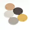 Venta al por mayor de fábrica 6-30 mm doble agujero cobre liso disco grabado logo pendientes de viento minimax colgante accesorios de cobre