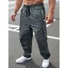 Pantalones casuales de trabajo para hombre, de color liso, sencillos y versátiles, con cordón y bolsillos, adecuados para primavera y otoño, disponibles en stock para comercio internacional