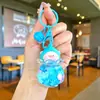 Llavero acrílico con forma de botella de arenas movedizas en aceite, regalo al por mayor, colgante de muñeca de donut, lindo llavero de arenas movedizas.