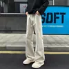 Pantalones de hombre de algodón lavado con corte diagonal marrón, marca de moda de verano, corte limpio, corte slim estilo americano, pantalones largos ligeramente acampanados