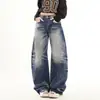 Pantalones unisex YKK retro americano lavados con diseño de salpicaduras azules desgastados, holgados, de alta costura, con corte curvo
