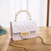 Comercio exterior al por mayor Cadena portátil de perlas de diamante bolsa de gelatina 2023 Nueva moda bolso de hombro bandolera generación de cabello
