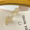 Pendientes pequeños y exquisitos de flor Perla circón para mujer temperamento lujo ligero alta calidad inteligentes de hada versátiles pendientes pendientes