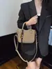 Bolso de tejido de moda estilo coreano para mujer, nuevo bolso cruzado de moda 2026, bolso tipo cubo texturizado de mano