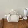 Bolso versátil de diseño de nicho estilo coreano transfronterizo, novedad de moda otoño 2026, bolso de hombro y cruzado de gran capacidad para ir al trabajo