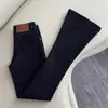 Jeans de Campana Negros para Mujer 2025 Invierno Tendencia Nuevos de Tiro Alto Adelgazantes Elásticos de Campana Hasta el Suelo