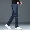 Jeans negros puros de Hong Kong para hombre, nueva colección primavera/otoño 2026, pantalones decigarette ajustados de moda, pantalones casuales elásticos