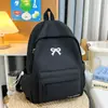 Mochila Estilo Japonés Fresca y Linda para Estudiantes Niñas, con Bordado y Moño, Color Sólido Elegante Mochila de Viaje