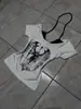 Camiseta de Mujer Estilo Callejero Europeo y Americano de Verano Personalidad Chica Picante Diseño Falso Dos Piezas Estilo Oscuro Estampada Halter Suéter