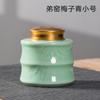 Tetera sellada con tapa metálica de celadón Longquan Kongshan New Rain, olla de embalaje para té Pu'er de cerámica mediana y grande