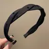 Faixa de cabeça larga de tricô minimalista e elegante estilo coreano para mulheres, novo modelo 2026, adequada para uso diário, projetada para realçar a aparência da linha do cabelo e pode ser usada como faixa de cabeça para lavar o rosto ou presilha de cabelo