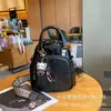 Bolsa de hombro cruzada de verano nuevo modelo de piel de oveja negra original hecha a mano estilo universitario retro simple casual mochila