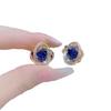 Elegantes pendientes de flor azul de circón en espiral, diseño súper brillante, pendientes exquisitos, pendientes de lujo ligero, estilo Hong Kong
