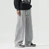 Calça Tricô Nova Outono e Inverno 2025 Tendência da Moda Cordão Ajustável na Barra Simples Solta Confortável Calça Casual