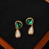 2024 Nuevo Estilo Elegantes Aretes Antiguos de Aleación con Incrustaciones de Perlas de Imitación Diseño Simple Aretes de Perlas de Imitación Verdes