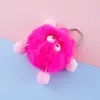Colgante de Pompones de Estudiante de Dibujos Animados Piel Sintética de Conejo Colgante Pequeño de Bola de Carbón Muñeca de Dibujos Animados Llavero de Coche