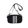Bolso cruzado pequeño nuevo para mujer, bolsa impermeable de nailon para cámara, bolso versátil y de moda para teléfono móvil, bolso de hombro y cruzado, producto de fábrica moderno