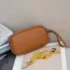 Bolso de mano de moda para mujer, venta al por mayor transfronteriza, bolso de mano de cuero, monedero TOGO, bolso de piel de vaca de capa superior para mujer 109