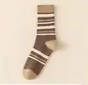 Calcetines de otoño e invierno para mujer color Maillard calcetines de caña media ins versátiles simples calcetines de felpa estilo universitario calcetines marrones