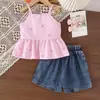 Conjunto de verano infantil transfronterizo para vacaciones en la playa, con top tipo camisola y pantalón falda con lazo, dulce y lindo, en stock