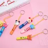 Pito de Madera de Dibujos Animados Regalo Creativo para Jardín de Infancia Instrumento Musical para Niños Llavero de Pito Pequeño Colgante para Bolso