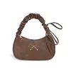 Bolso de mano con lazo para mujer, nueva colección otoño 2026, moderno y versátil, bolso de hombro de alta gama, diseño único, bolso tote y de axila