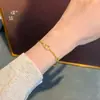 Tienda de Oro Mismo Estilo Arena Dorada Pulsera de Monedas Calabaza con Diamantes Completos Pulsera de Diseño de Lujo Ligero de Nicho para Novia Regalo