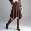 Falda midi irregular de cintura alta adelgazante para mujer, otoño e invierno, temperamento de oficina, que cubre la cadera, realza la altura