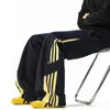 Pantalones de chándal de pierna ancha con bloques de color a rayas estilo americano para hombres y mujeres, Otoño, Hip Hop, Holgados, Deportivos Casuales, Pantalones Deportivos Versátiles