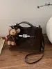 Bolsa Pequena Retro de Alta Qualidade para Uso Diário Transfronteiriça Feminina 2026 Nova Versátil Bolsa Transversal Bolsa de Mão Super Quente Bolsa para Mãe e Filho