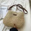 Una generación de nuevos bolsos tejidos a mano bandolera de vacaciones moda de playa bolso de paja de bosque de playa