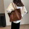 Bolso de mano retro de estilo coreano más vendido para mujer, nuevo modelo 2026, bolso de hombro para el trabajo, bolso de hombro de gran capacidad a la moda para mujer