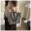 Bolso de compras de nicho de Corea del Sur, bolso de hombro artístico vintage, bolso de lona a rayas de estilo fresco, nuevo bolso de mano 2023