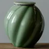 Jarra de chá de jade sedoso celadon do Forno Yue de Shanding jarra de cerâmica criativa jarra de chá para casa armazém de chá jarra de armazenamento de chá jarra selada