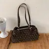 Bolso coreano de nuevo estilo Otoño 2026 Alta apariencia Personalidad Lunares Elegante Bolso de axila Moda Viaje Diario Bolso de un solo hombro