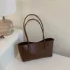 Bolso de Mano con Colgante para Mujer Otoño Invierno Versátil Moda Madre-Hija 2026 Bolso para el Trabajo Nuevo Simple Un Solo Hombro Debajo del Brazo