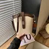 Bolso Cubo Versátil Moda Retro Maillard para Mujer 2026 Nuevo Otoño Nicho para el Trabajo Bolso de Hombro Cruzado