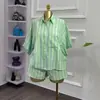 Moda Feminina Transfronteiriça Europeia e Americana Verão 2026 Novo Estilo Fresco e Solto Conjunto de Camisa de Manga Curta Listrada e Shorts