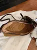 Bolso liso muy elegante 2026 nuevo bolso de axila francés de nicho para el día a día bolso de hombro cruzado casual a la moda para mujer