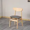 Cadeiras de jantar estilo nórdico com encosto de borboleta em madeira maciça, design simples e moderno, adequadas para uso doméstico, restaurantes e ambientes de refeições casuais.; disponível para atacado