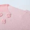 Venta al por mayor de ropa para mujer estilo europeo y americano transfronteriza, conjunto de punto de top largo de manga larga floral moderno y elegante y falda de punto tipo umbrella de cintura alta