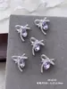 Accesorios de Arte para Uñas de Moño Nuevos y de Moda Diamante Morado Plateado Lujo Ligero Mariposa Corazón Oso 3D Accesorios para Uñas Portátiles