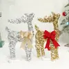 Adorno de reno luminoso tejido hueco de hierro forjado, decoración de ambiente navideño, decoración para escaparates comerciales y de supermercados