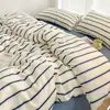 Juego de ropa de cama de cuatro piezas estilo japonés a rayas vintage simple transfronterizo lavado y cepillado, juego de tres piezas de sábana y funda de edredón, disponible para dropshipping