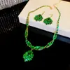 Nuevos pendientes y collar de circonita colorida estilo europeo y americano, cadena para la clavícula de lujo ligero de alta gama, juego de joyas elegante y con estilo