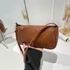 2026 Cor Sólida Casual Moda Padrão Tecido Design Simples Estiloso Grande Capacidade Bolsa de Mão Tendência Bolsa de Ombro Bolsa de Braço para Mulheres