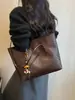 Bolso tejido de patrón retro de moda transfronterizo para mujer 2026 nuevo bolso de hombro para el trabajo bolso de mano de gran capacidad bolso tote moderno