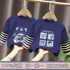Camiseta de manga larga para niño, nuevo modelo primavera y otoño 2026, top estiloso para niños, camiseta base de moda de imitación de dos piezas para niños mayores