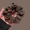 Elástico de Cabelo Estampa de Leopardo Intestino Grosso Feminino 2026 Novo Outono Inverno Estilo Coreano Acessórios de Cabelo Sensação de Alto Padrão Corda de Cabelo Elástico de Cabelo Acessórios de Cabelo Versáteis